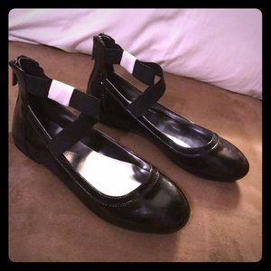 Dressy black flats with criss-cross ankle strap